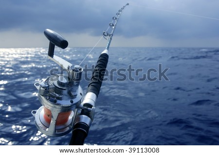 Deep  Fishing Show on Stock Photo   Big Game Boat Fishing In Deep Sea On Boat Under Cloudy