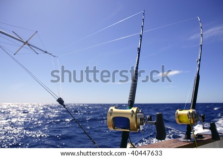 Big game boat fishing in deep sea on boat