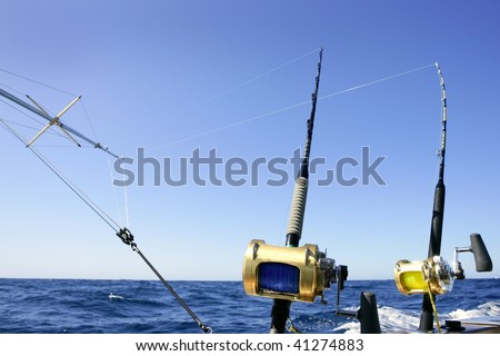 Big game boat fishing in deep sea on boat