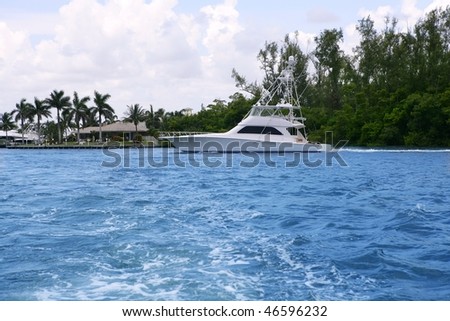 Blue waterway in Florida with fishing boat Pompano Beach