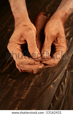 pottery craftsmanship potter craftsman hands working red clay