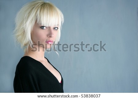blonde beautiful fashion girl gray background