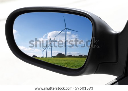 rearview car driving mirror view windmill electric aerogenerator  [Photo Illustration]