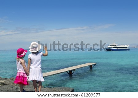 two girls tourist turquoise sea back goodbye boat hand gesture Formentera