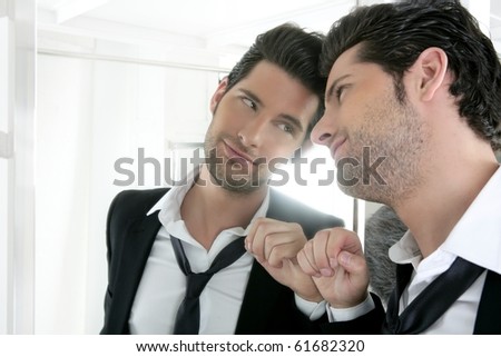 stock-photo-handsome-narcissistic-suit-proud-young-man-looking-himself-in-the-mirror-61682320.jpg