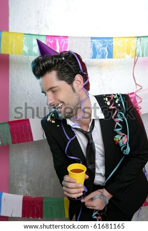 Happy party young man drinking enjoying alone laughing