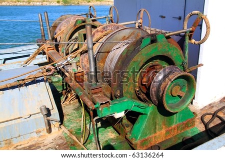 capstan winch of trawler fishing boat power engine to pull the net steel cable