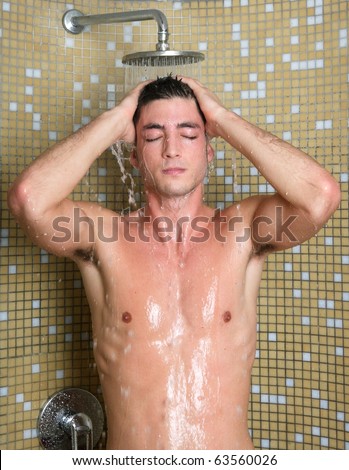 stock photo young handsome sexy nude man in shower tile bathroom