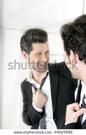 Handsome suit proud young man humor funny gesturing in a mirror