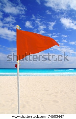 Beach red flag bad weather wind advice dangerous Caribbean turquoise sea