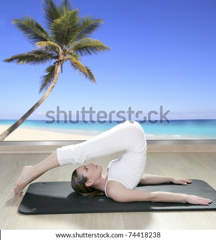 black mat yoga woman window view of palm tree beach tropical sea [Photo Illustration]