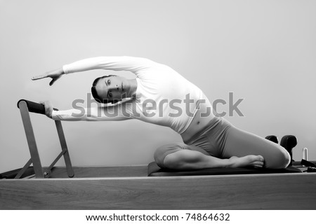 black and white pilates woman sport fitness portrait on reformer