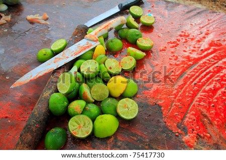 achiote knifes and lemons after preparinng achiote tikinchick Mayan sauce Mexico
