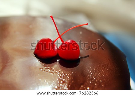 cherry and chocolate brownie cake macro perspective