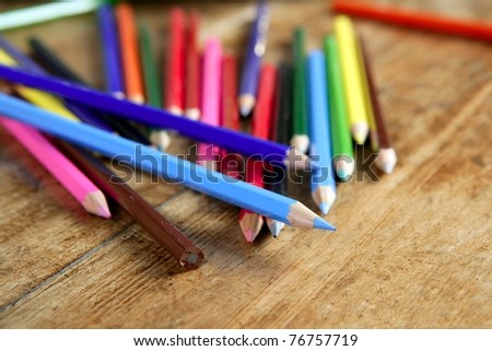 colorful pencil arrangement casual on wooden desk vintage retro