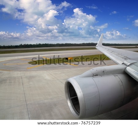 airplane in landing runway road plane wing blue sky
