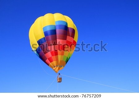 balloon colorful vivid colors in blue sky flying ship