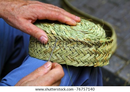 stock photo : craftsman sewing basket esparto grass weaver from Spain