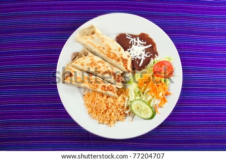 Burritos mexican rolled food rice salad and frijoles Mexico food