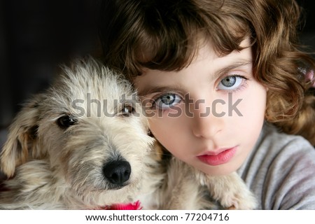 dog puppy and girl hug portrait closeup blue eyes white hairy little doggy