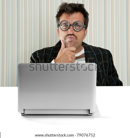 Nerd pensive man glasses silly expression laptop computer thinking a solution [Photo Illustration]