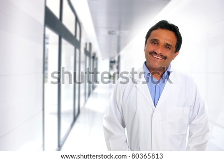 Indian latin expertise doctor smiling in the hospital corridor [Photo Illustration]