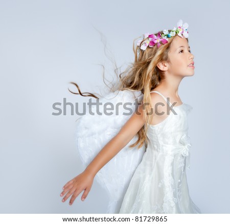 Angel child girl with wind in hair Angel child girl with wind in hair