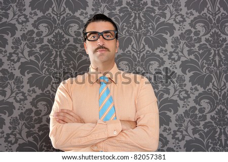 businessman nerd portrait with retro glasses over wallpaper background