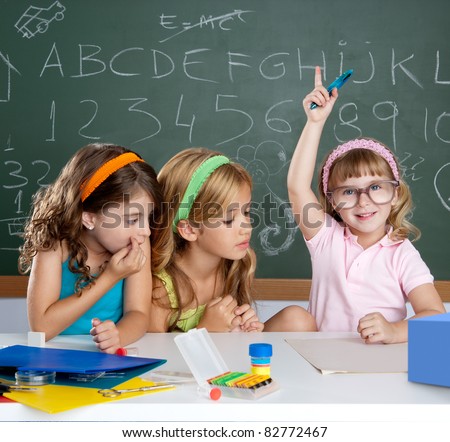 clever children student girl raising hand at school classroom