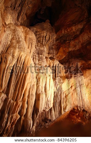 cave stalactites underground cavern magic light in Pyrenees Spain