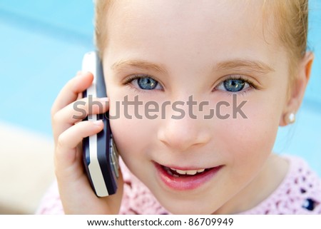 child little girl talking mobile phone in pool with happy gesture