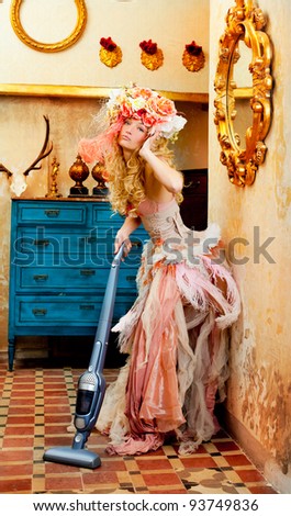 baroque fashion blonde housewife woman at vacuum cleaner chores