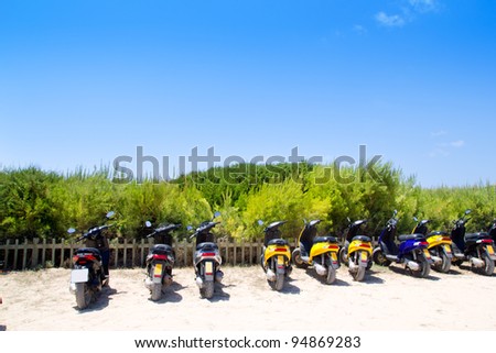Formentera scooter bikes parking near the beach in Spain