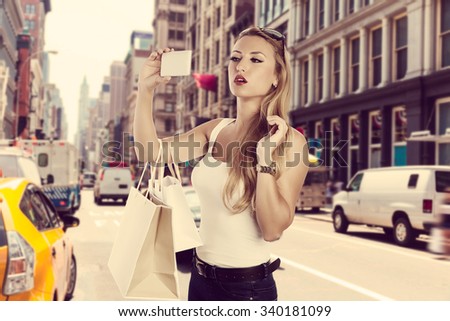 Blond shopaholic tourist girl selfie photo in Soho New York Photomount