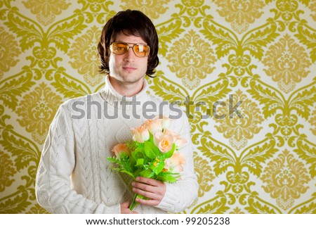 retro hip young man vintage glasses holding valentines flowers bouquet on wallpaper