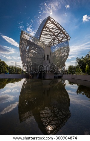 Louis Vuitton Foundation PARIS, FRANCE - June 18, 2015: building. Made of 3,584 laminated glass panels, it was designed by the architect Frank Gehry and opened to the public in 2014.