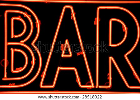 A close-up of a neon red bar sign