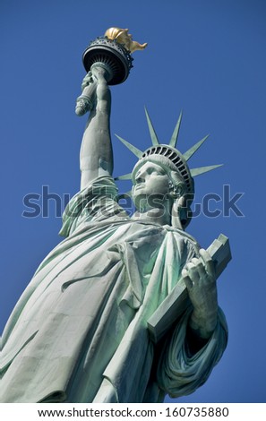 Statue of Liberty on Hudson River in NYC.