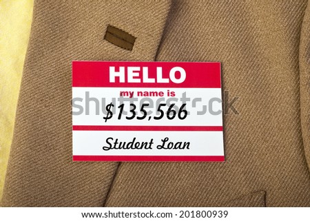 Student loan name badge on jacket.