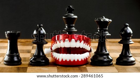 Chess players a game of war chomping your way ahead.