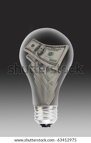 Burning money with old style light bulbs.