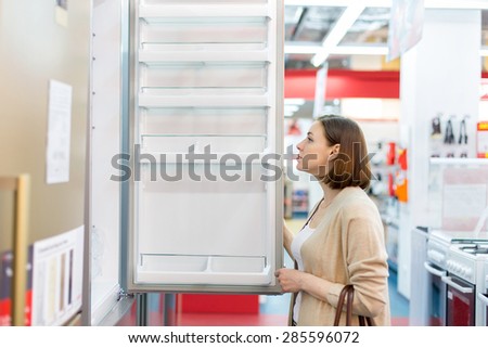 woman buys a refrigerator