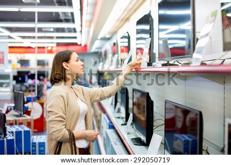 woman buys a TV
