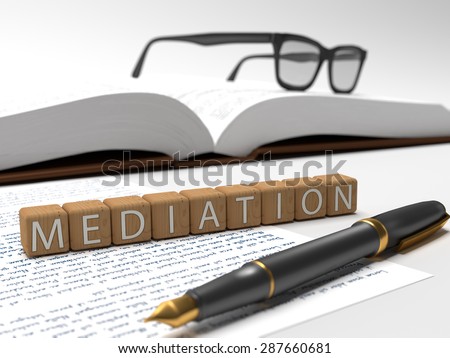 Mediation - dices containing the word mediation, a book, glasses and a fauntain pen.