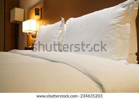 Image of comfortable pillows and bed