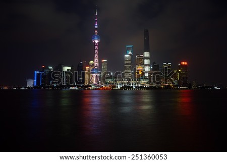SHANGHAI, CHINA - February 6, 2015: New Shanghai skyline with the Oriental Pearl Tower, Shanghai World Financial Center, Jin Mao Tower and Shanghai Tower on February 6, 2015 in Shanghai.