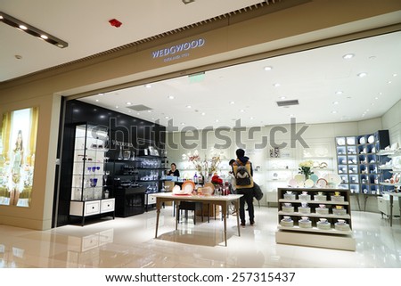 SHANGHAI, CHINA - March 2. 2015: Interior of the new IAPM Shopping Mall downtown in old French Concession. Wedgwood store inside Just after Chinese new year at March 2. 2015 Shanghai, China