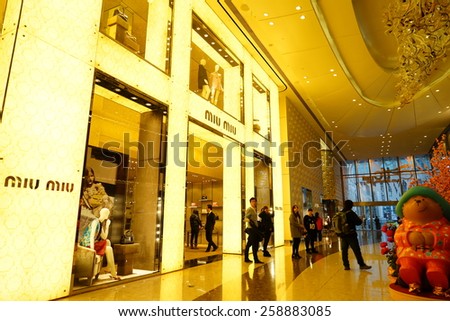 SHANGHAI, CHINA - March 8. 2015: Interior of the IFC Shopping Mall downtown in Pudong Lujiazui. MIUMIU inside Just The international women\'s day at March 8. 2015 Shanghai, China