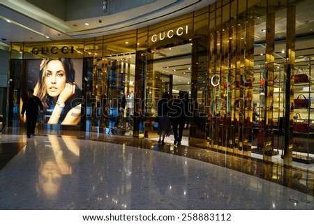 SHANGHAI, CHINA - March 8. 2015: Interior of the IFC Shopping Mall downtown in Pudong Lujiazui. GUCCI inside Just The international women\'s day at March 8. 2015 Shanghai, China