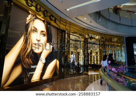 SHANGHAI, CHINA - March 8. 2015: Interior of the IFC Shopping Mall downtown in Pudong Lujiazui. GUCCI inside Just The international women's day at March 8. 2015 Shanghai, China